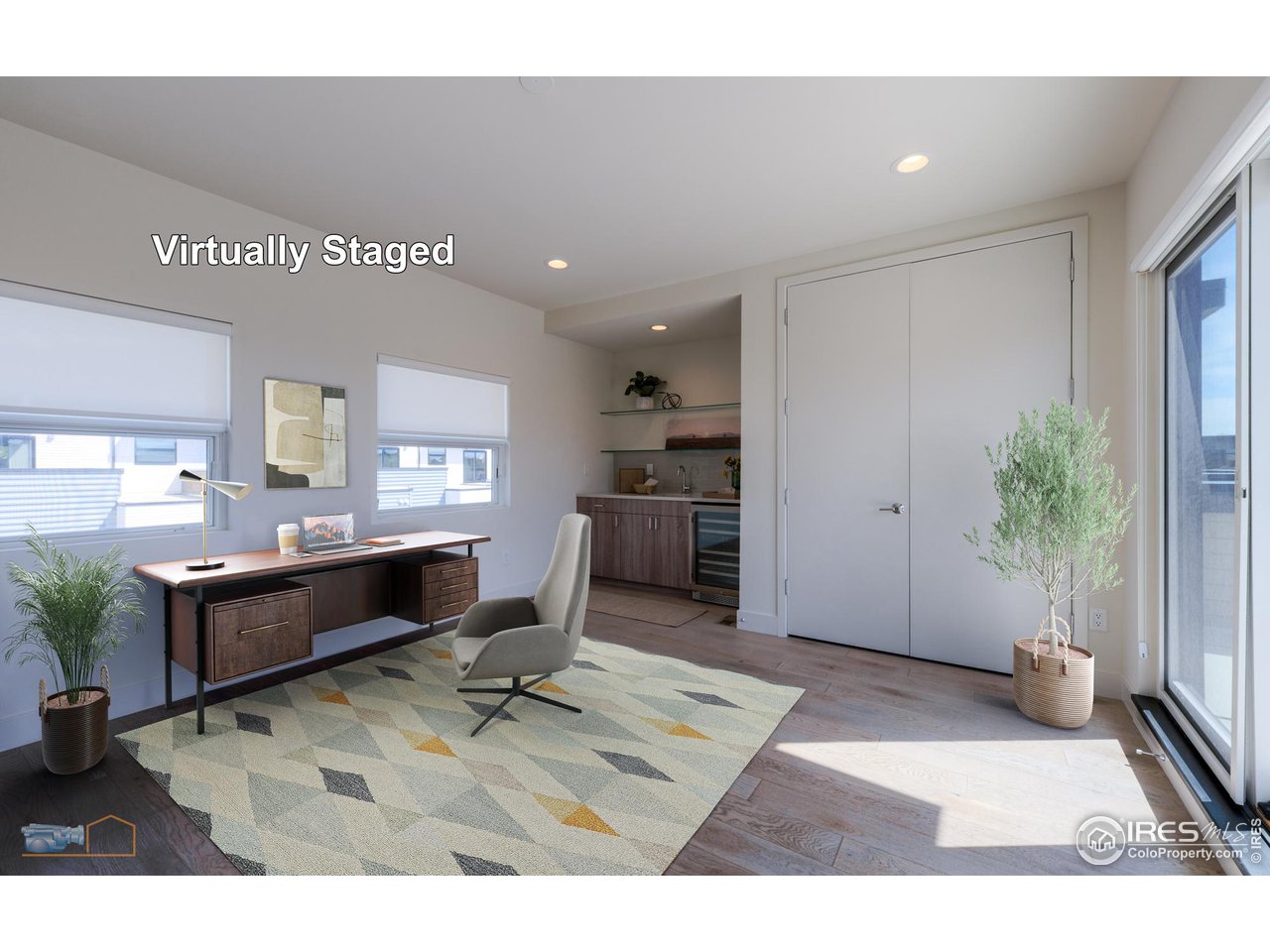 3105 Bluff Street Boulder, CO 80301 - Photo 31 of 40 a living room with furniture and a potted plant