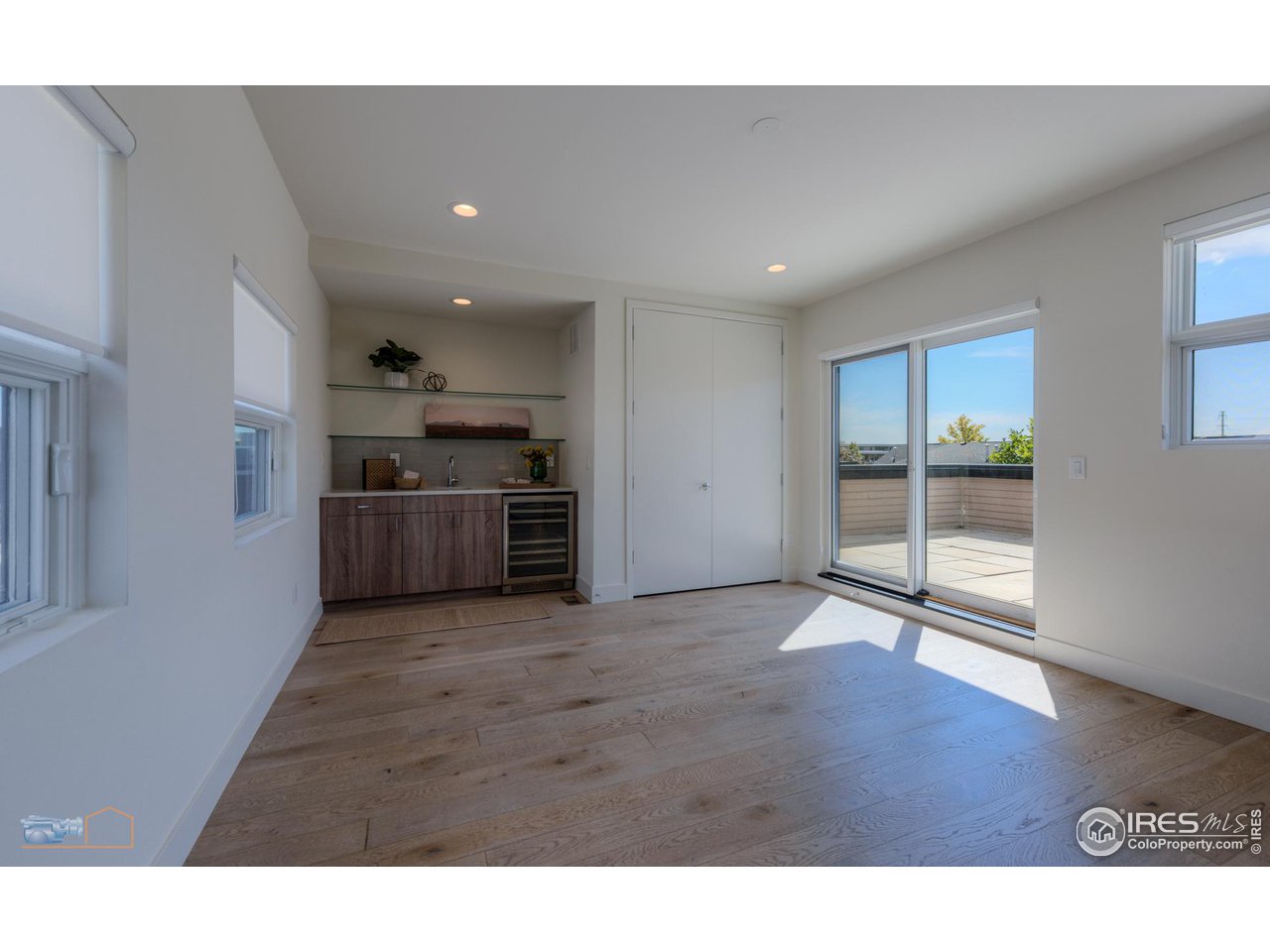 3105 Bluff Street Boulder, CO 80301 - Photo 32 of 40 a view interior of kitchen and hall with wooden floor