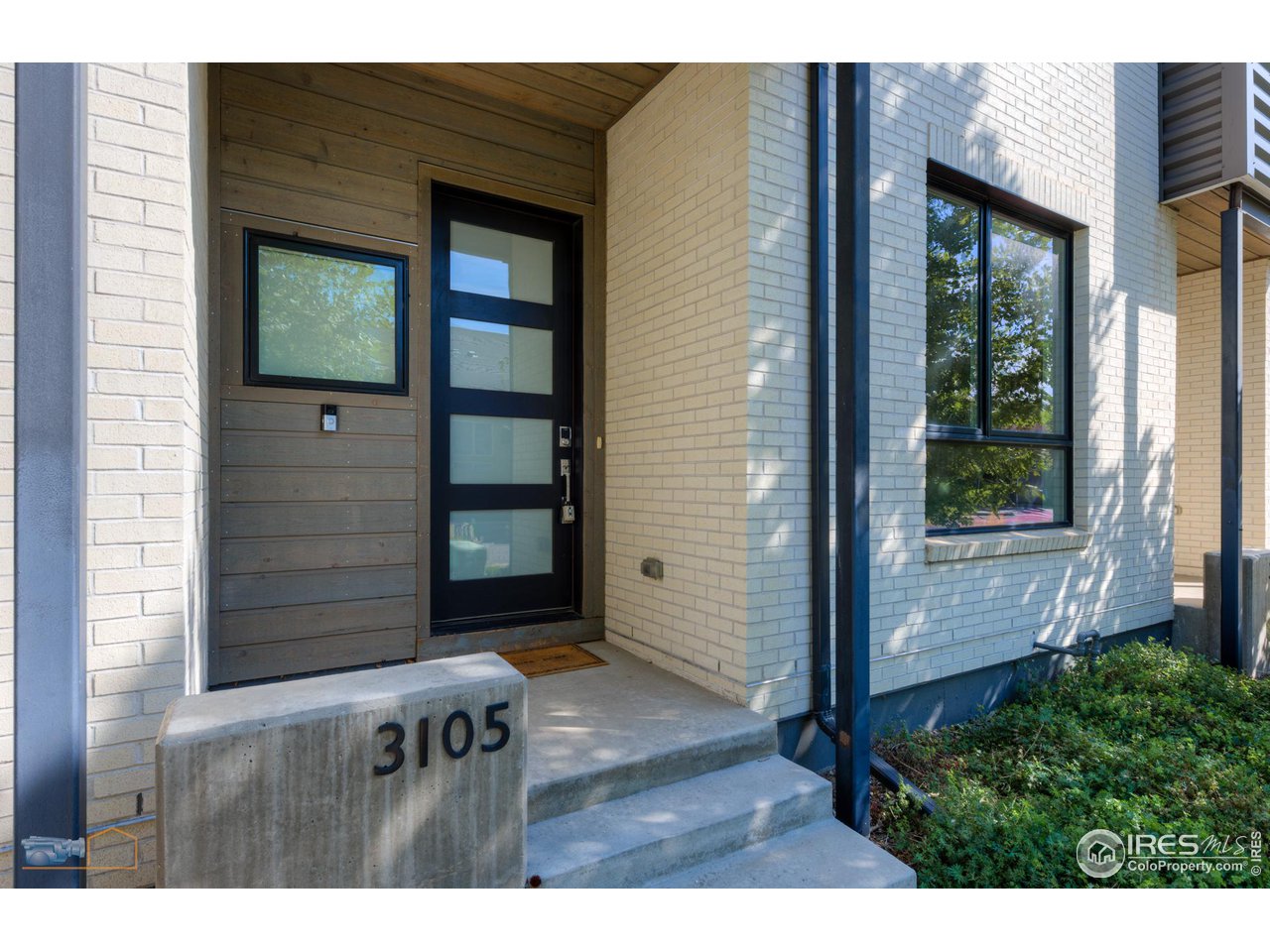 3105 Bluff Street Boulder, CO 80301 - Photo 6 of 40 a view of outdoor space and front door of house