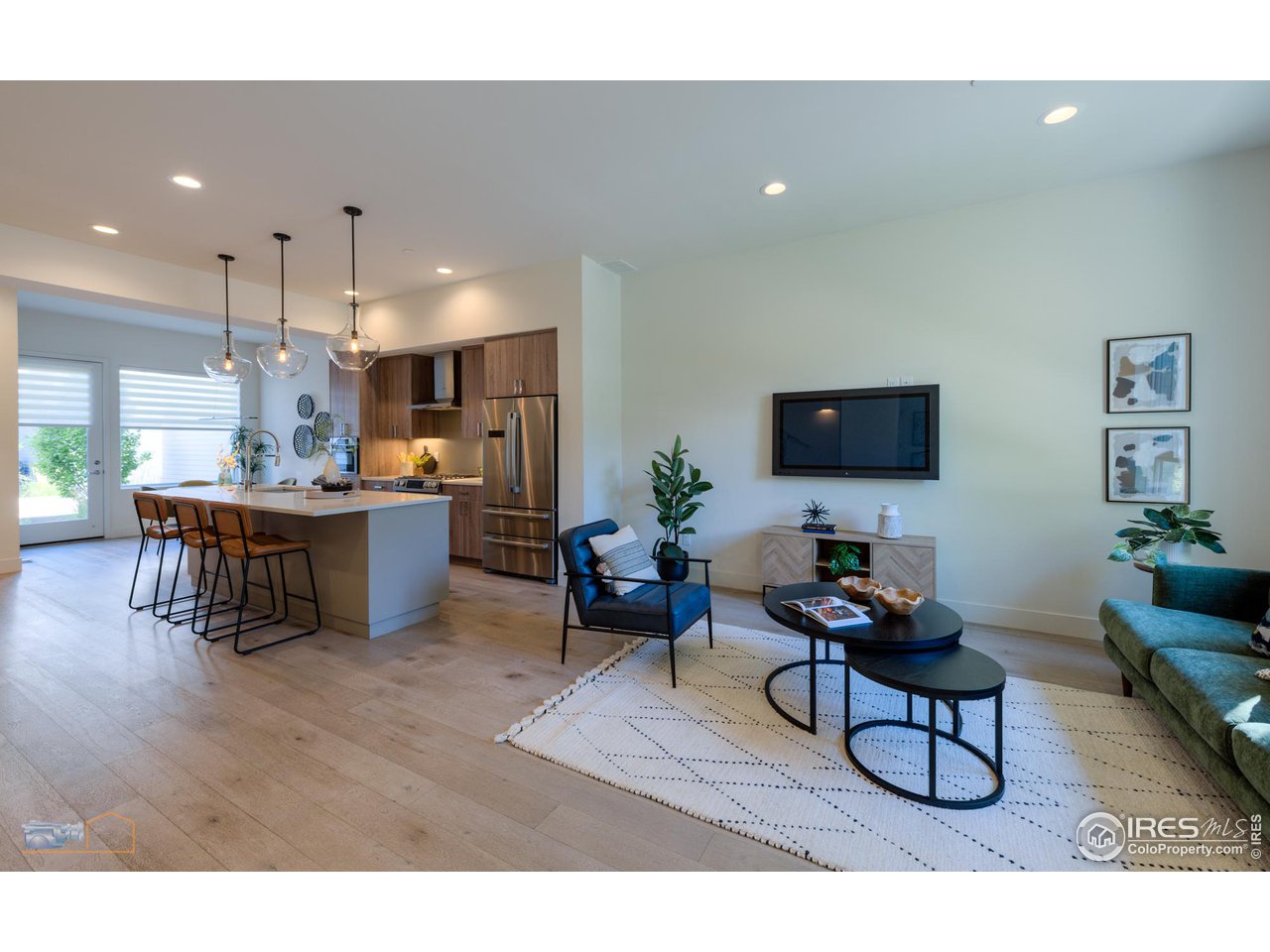 3105 Bluff Street Boulder, CO 80301 - Photo 7 of 40 a living room with furniture and a flat screen tv