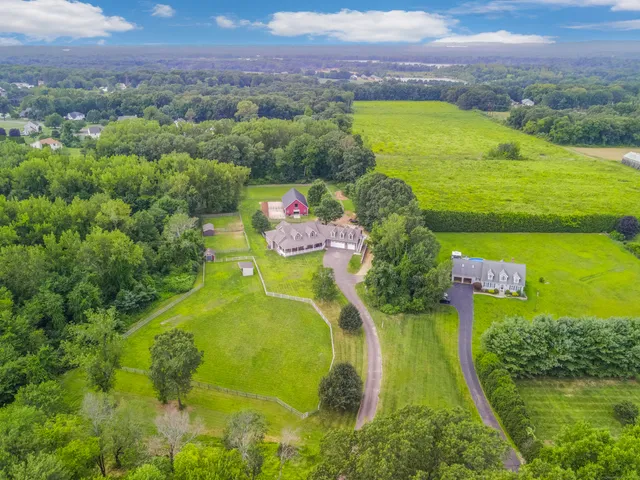 a view of a swimming pool with a yard