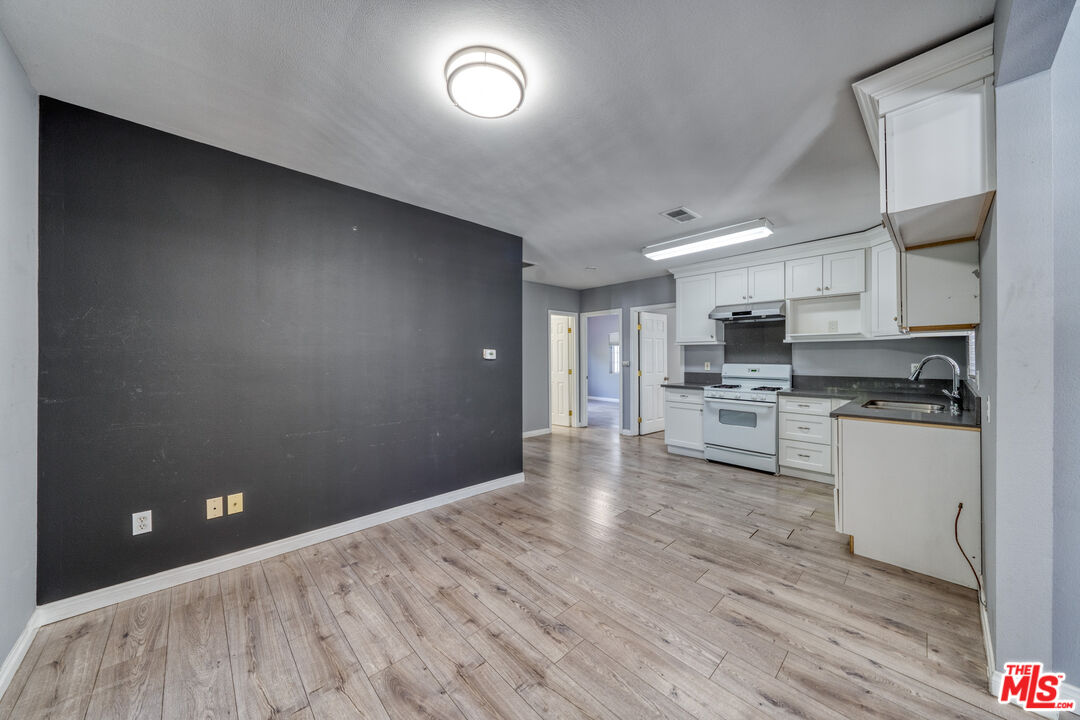 117 South Virgil Avenue Los Angeles, CA 90004 - Photo 16 of 33 a view of kitchen with wooden floor
