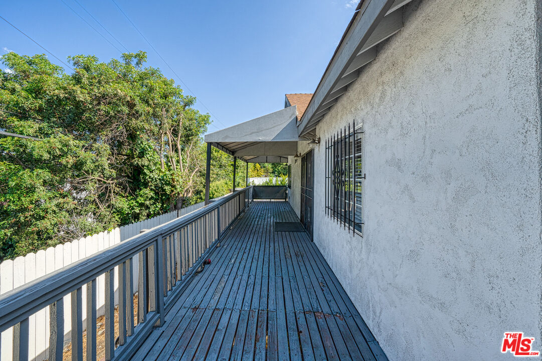 117 South Virgil Avenue Los Angeles, CA 90004 - Photo 25 of 33 a view of balcony with wooden floor