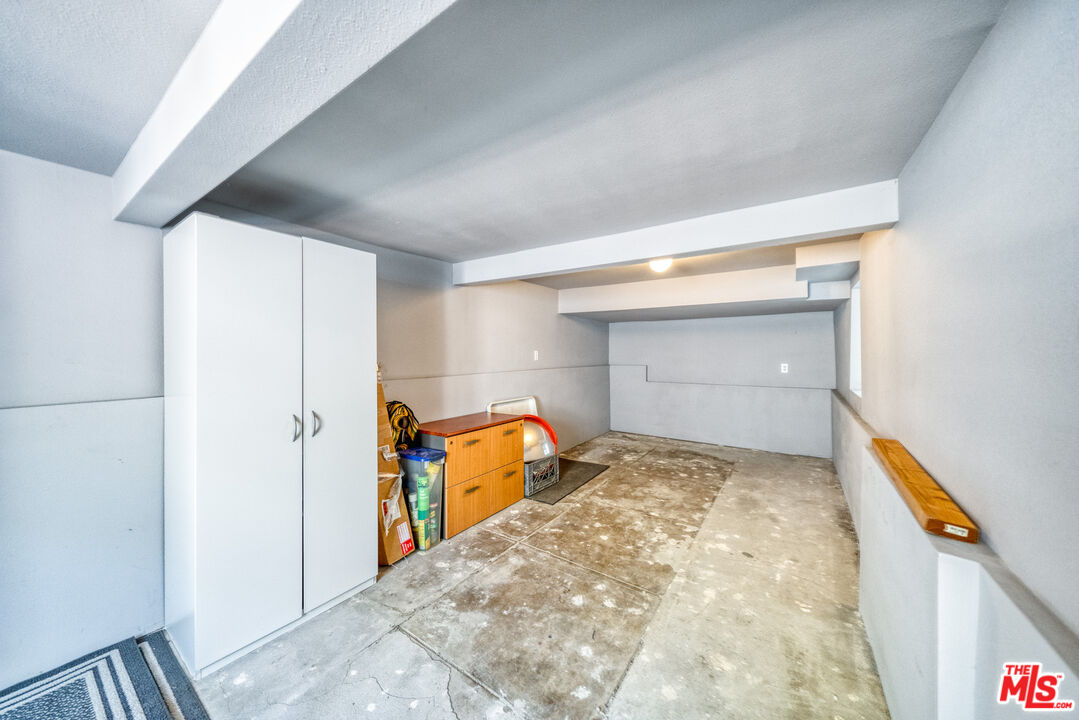 117 South Virgil Avenue Los Angeles, CA 90004 - Photo 31 of 33 a view of a hallway to room with stairs and toys