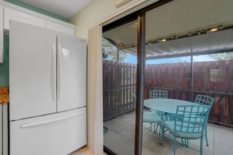 a bedroom with two beds and a window