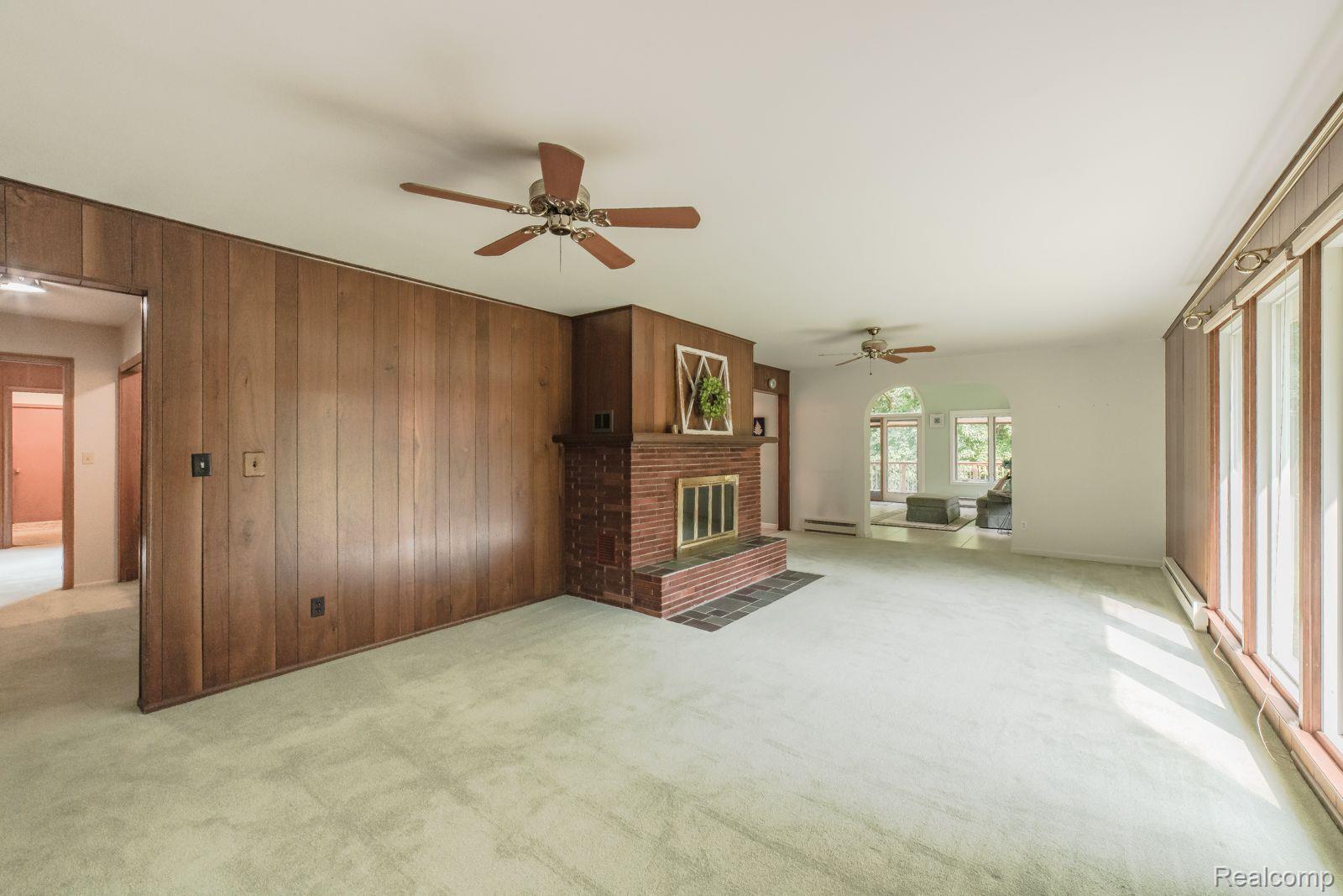 3925 Welch Road Attica, MI 48412 - Photo 5 of 40 Sprawling living room with natural fireplace