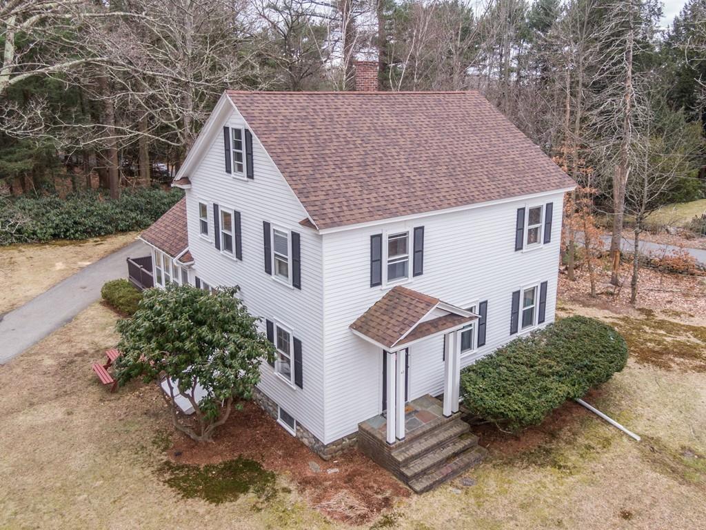 42 Ballardvale Road Andover, MA 01810 - Photo 1 of 34 a view of a house with a yard and large trees