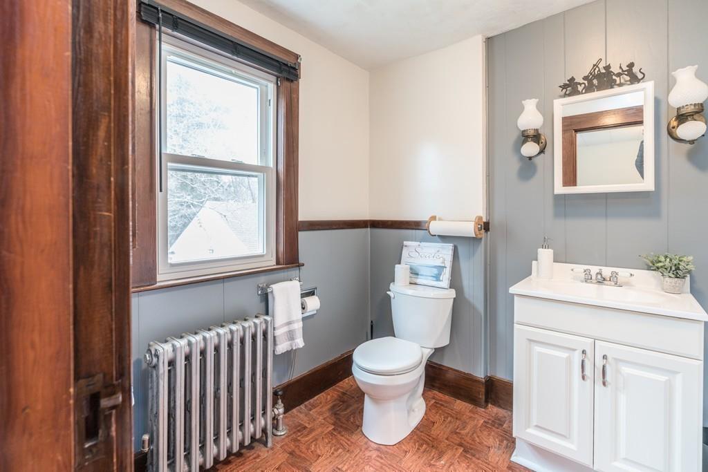 42 Ballardvale Road Andover, MA 01810 - Photo 20 of 34 a white toilet sitting next to a bathroom sink