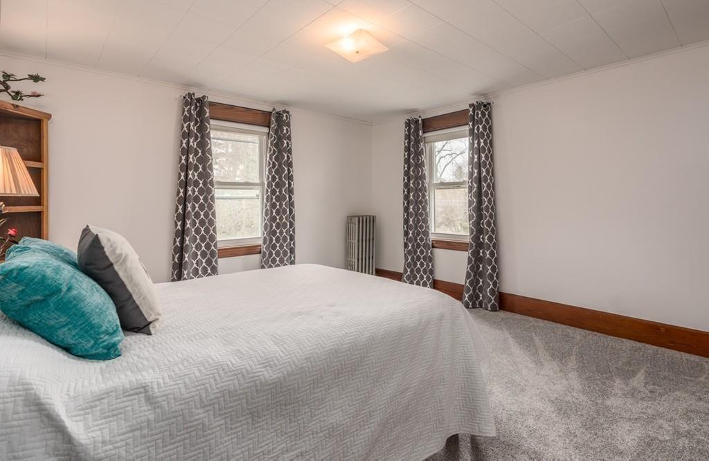 42 Ballardvale Road Andover, MA 01810 - Photo 25 of 34 a bedroom with a bed and a window