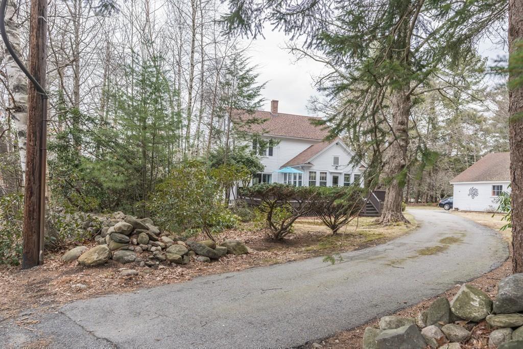42 Ballardvale Road Andover, MA 01810 - Photo 32 of 34 a view of a house with a tree in the background
