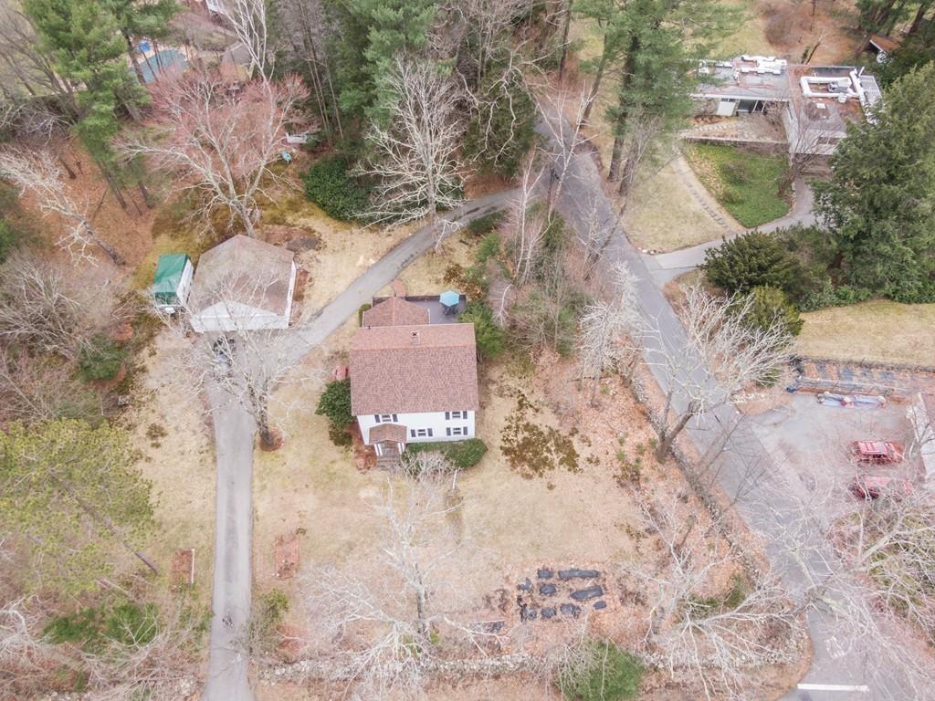 42 Ballardvale Road Andover, MA 01810 - Photo 33 of 34 a picture of a tree in front of a house