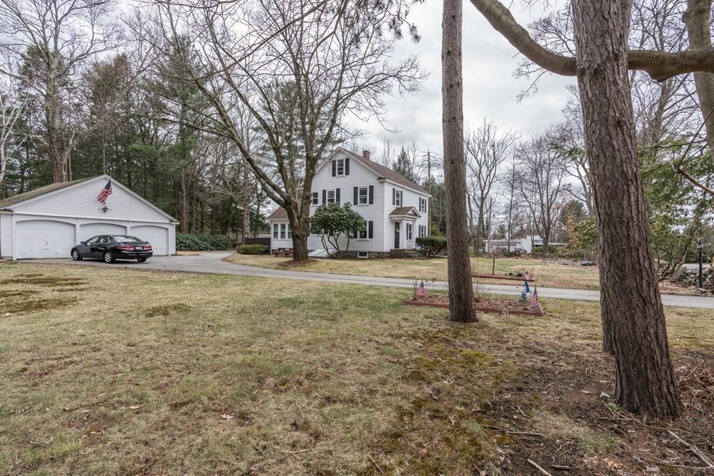 42 Ballardvale Road Andover, MA 01810 - Photo 34 of 34 a yellow house with trees in front of it