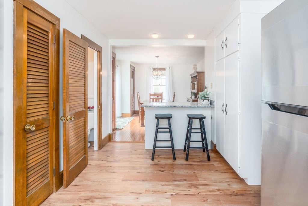 42 Ballardvale Road Andover, MA 01810 - Photo 6 of 34 a view of a kitchen from the hallway