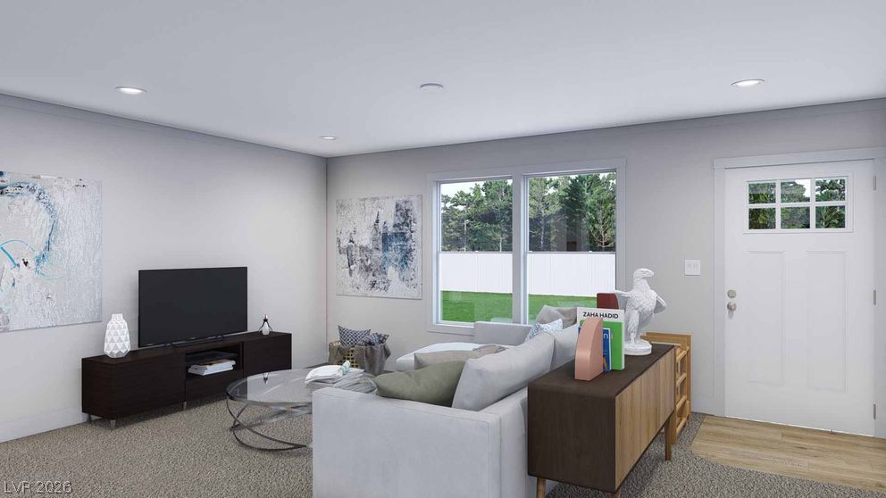 478 Box Canyon Road Alamo, NV 89001 - Photo 5 of 15 Recessed lighting and soft carpeting define this welcoming open living space.
