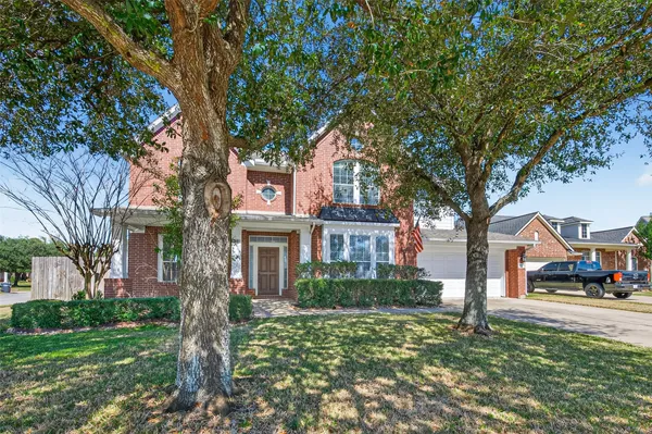 a house with trees in front of it