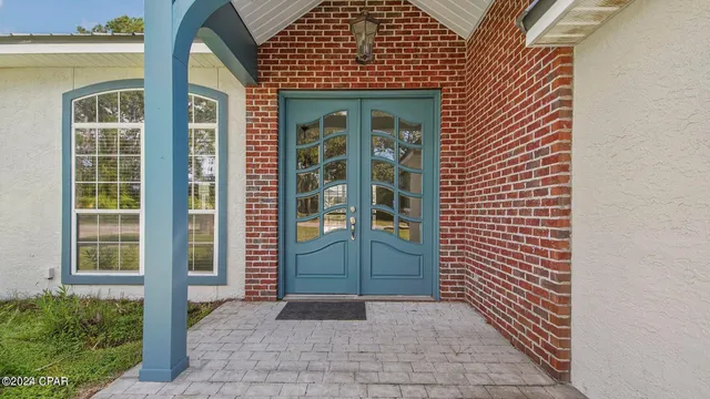 a kitchen with a sink stove and refrigerator