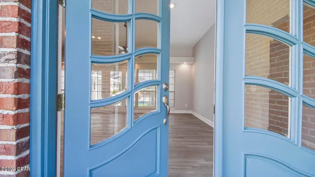 a kitchen with stainless steel appliances granite countertop a stove refrigerator and microwave