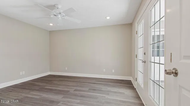 a view of a house with backyard and porch