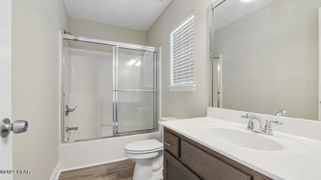 a backyard of a house with a yard and garage