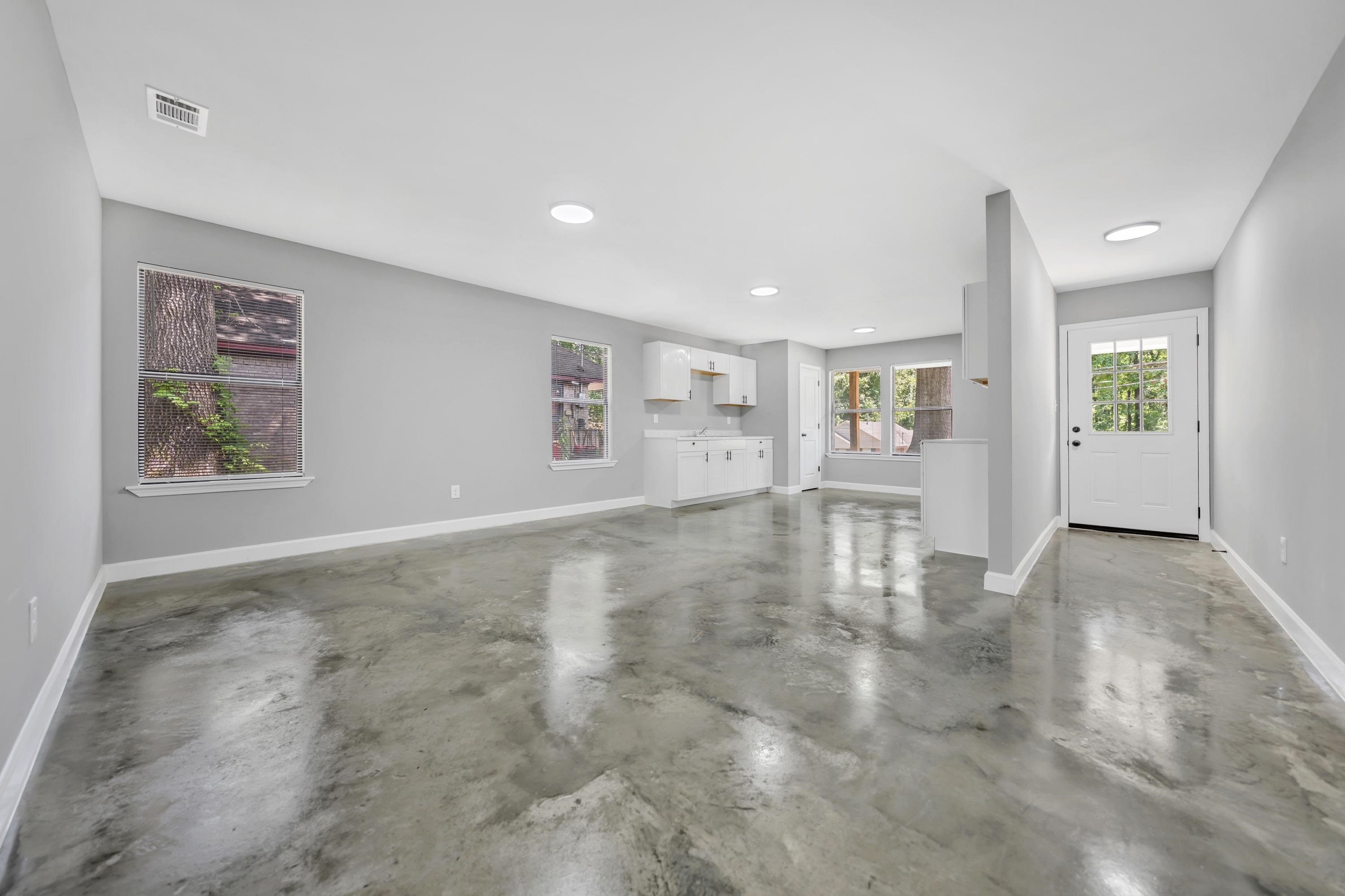 718 Hazelwood Road Memphis, TN 38109 - Photo 10 of 11 a view of an empty room with a window