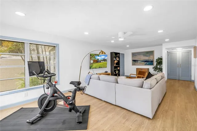 a view of a livingroom with furniture and a window