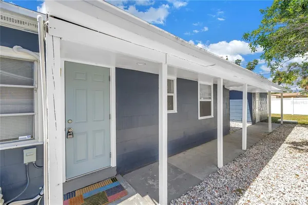 a view of a backyard with a garden