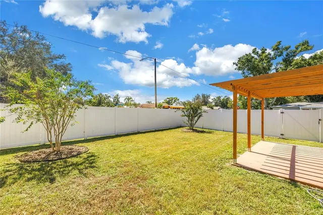 a front view of a house with a large window