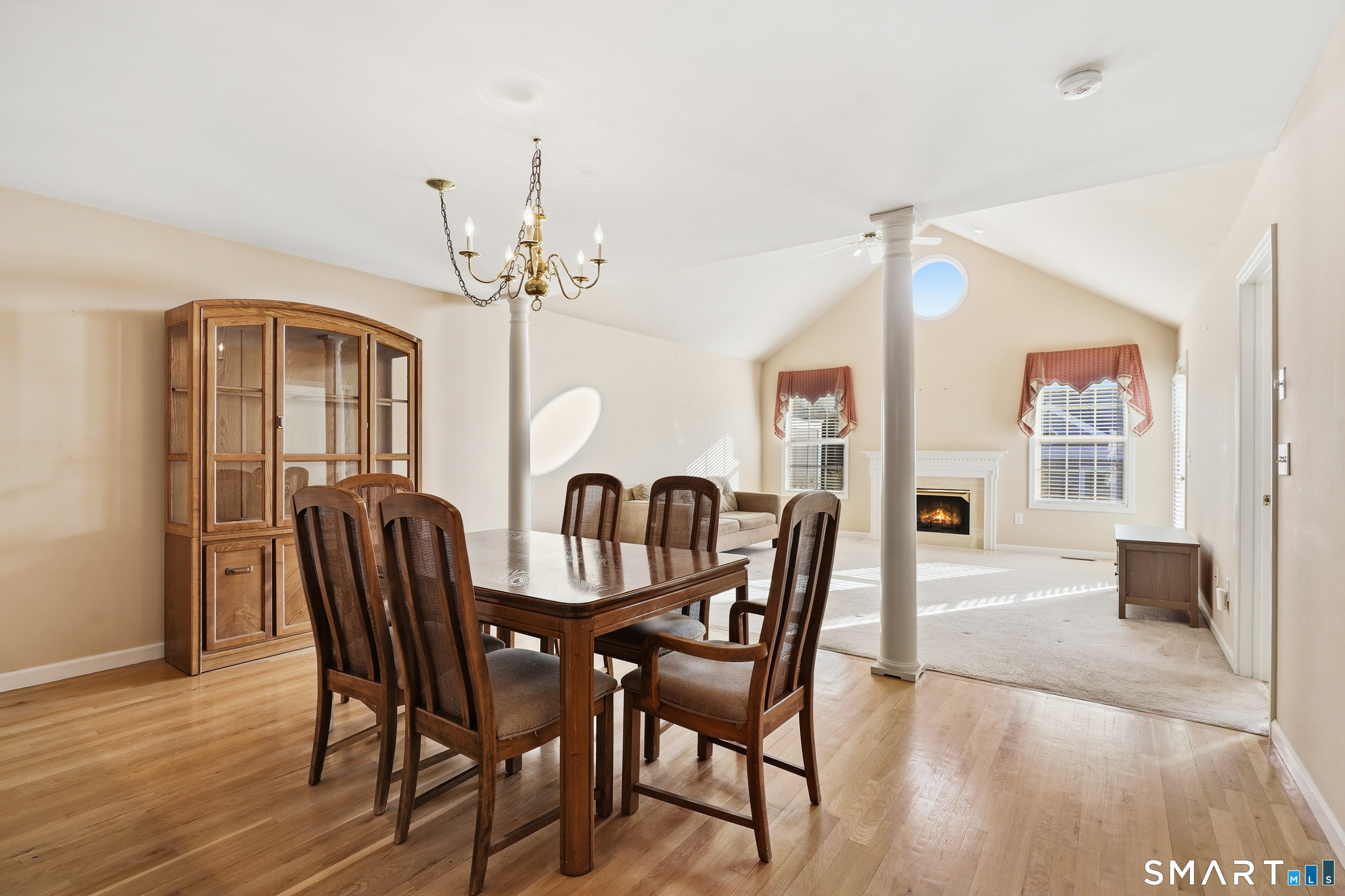 31 St George Place, Unit 31 Newtown, CT 06482 - Photo 11 of 30 a view of a dining room with furniture and wooden floor