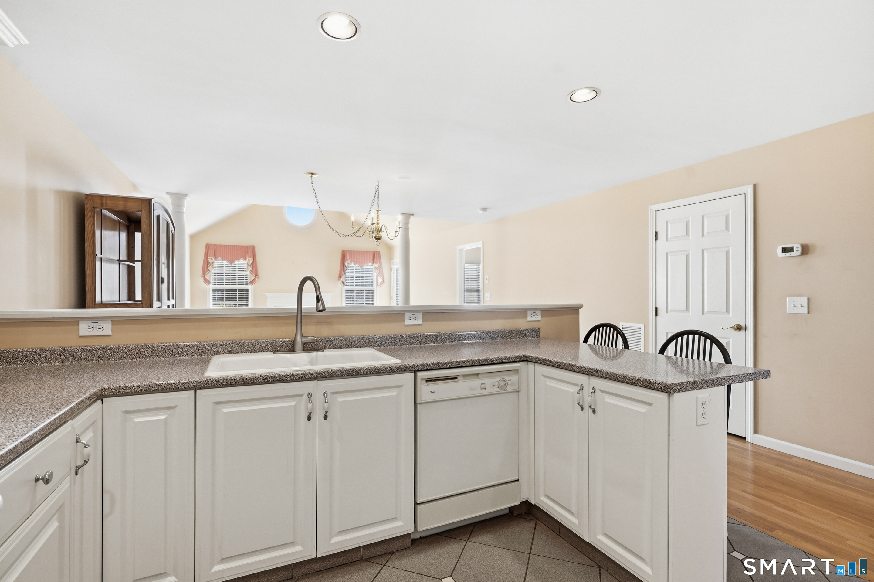 31 St George Place, Unit 31 Newtown, CT 06482 - Photo 15 of 30 a kitchen with a sink and a window