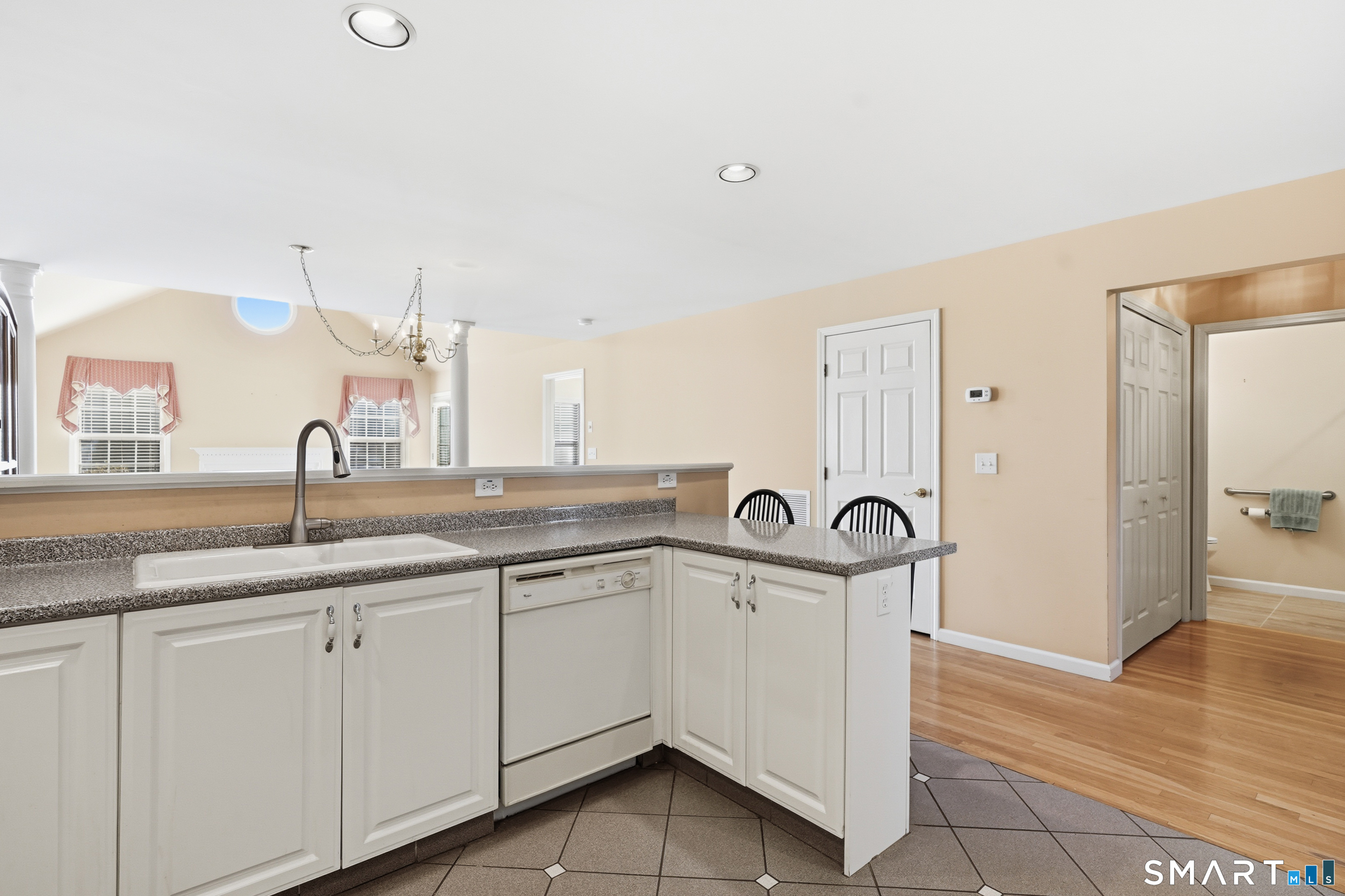 31 St George Place, Unit 31 Newtown, CT 06482 - Photo 18 of 30 a bathroom with a sink and a mirror