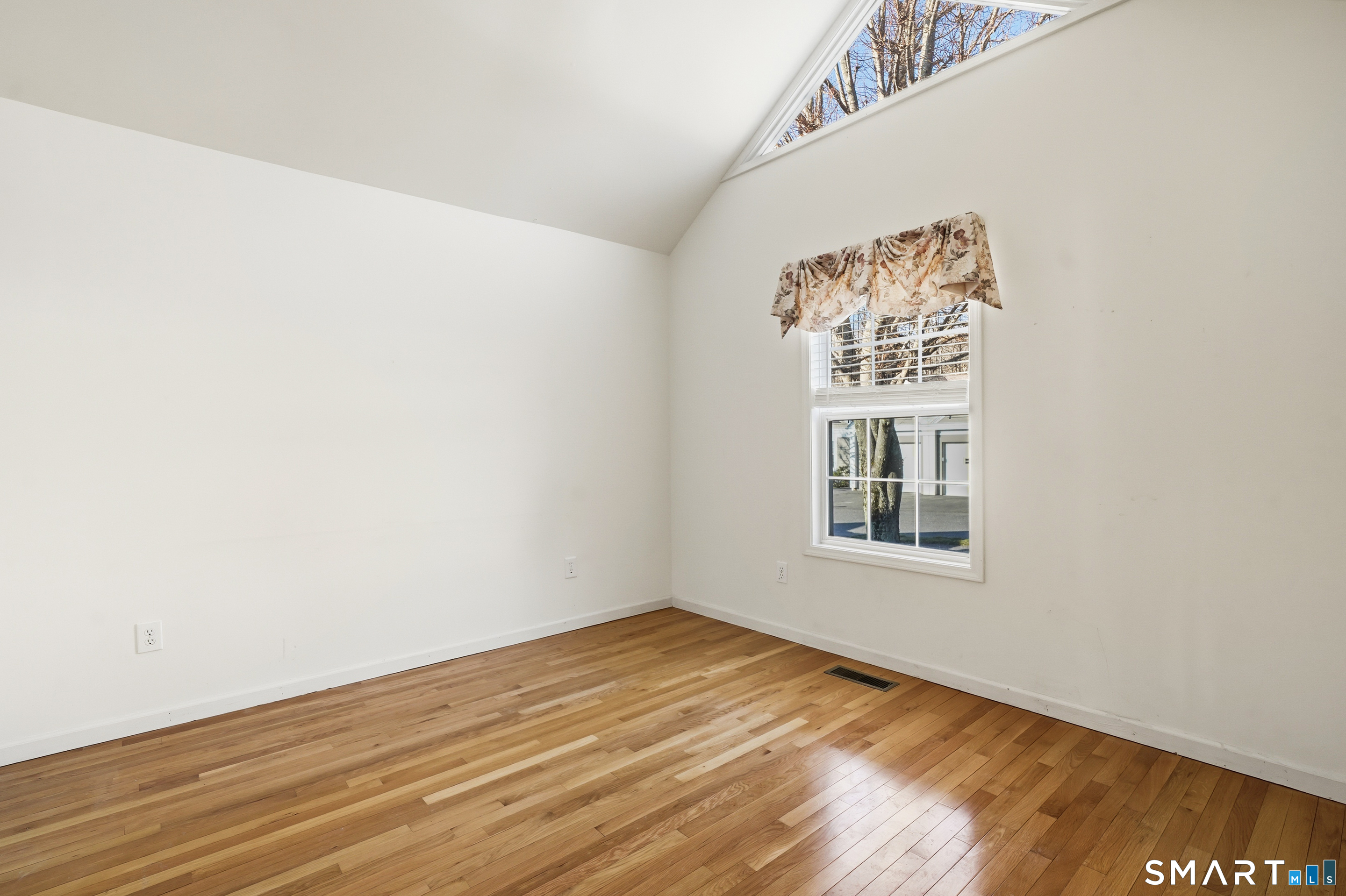 31 St George Place, Unit 31 Newtown, CT 06482 - Photo 23 of 30 a view of an empty room with a window