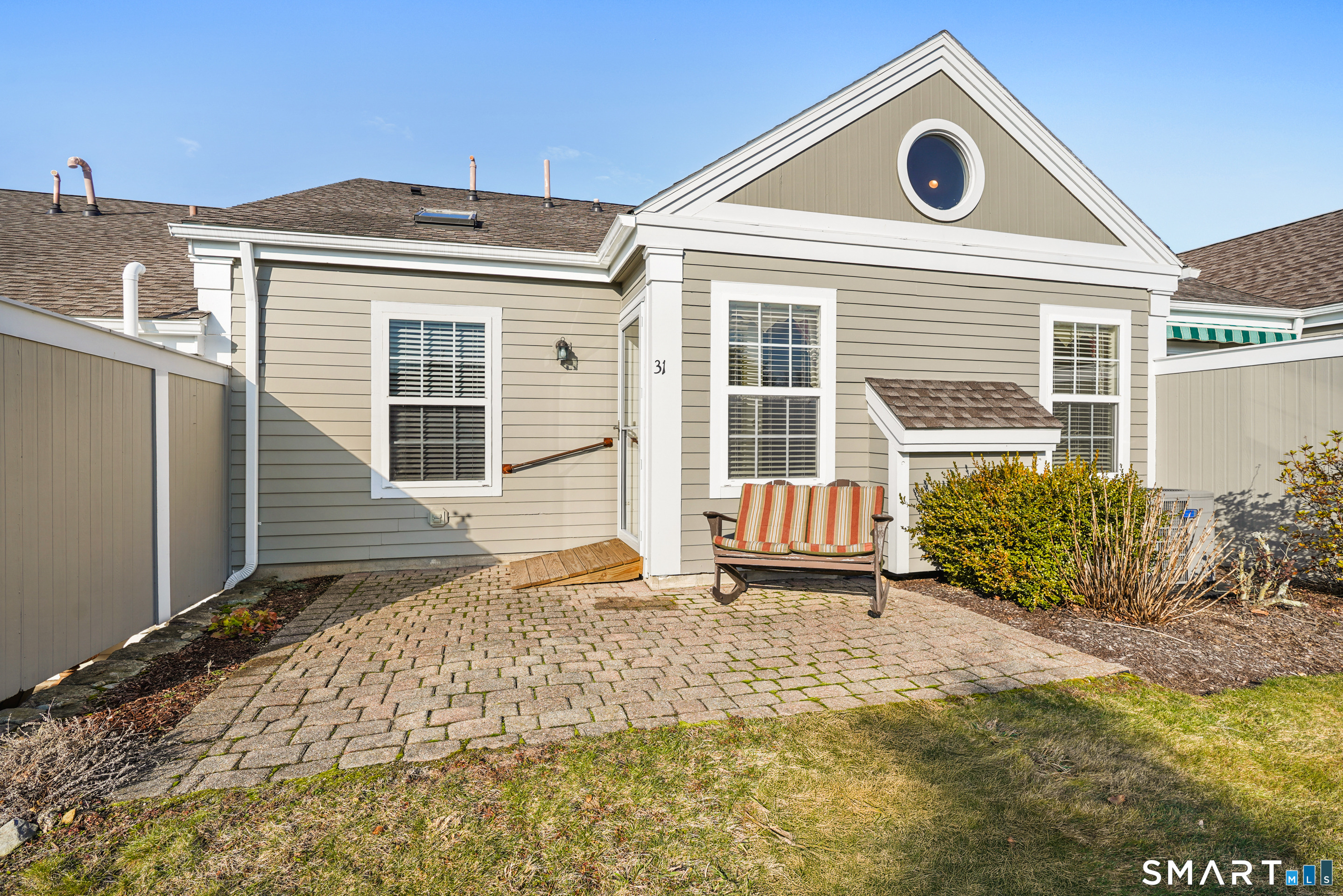 31 St George Place, Unit 31 Newtown, CT 06482 - Photo 29 of 30 a front view of a house with garden