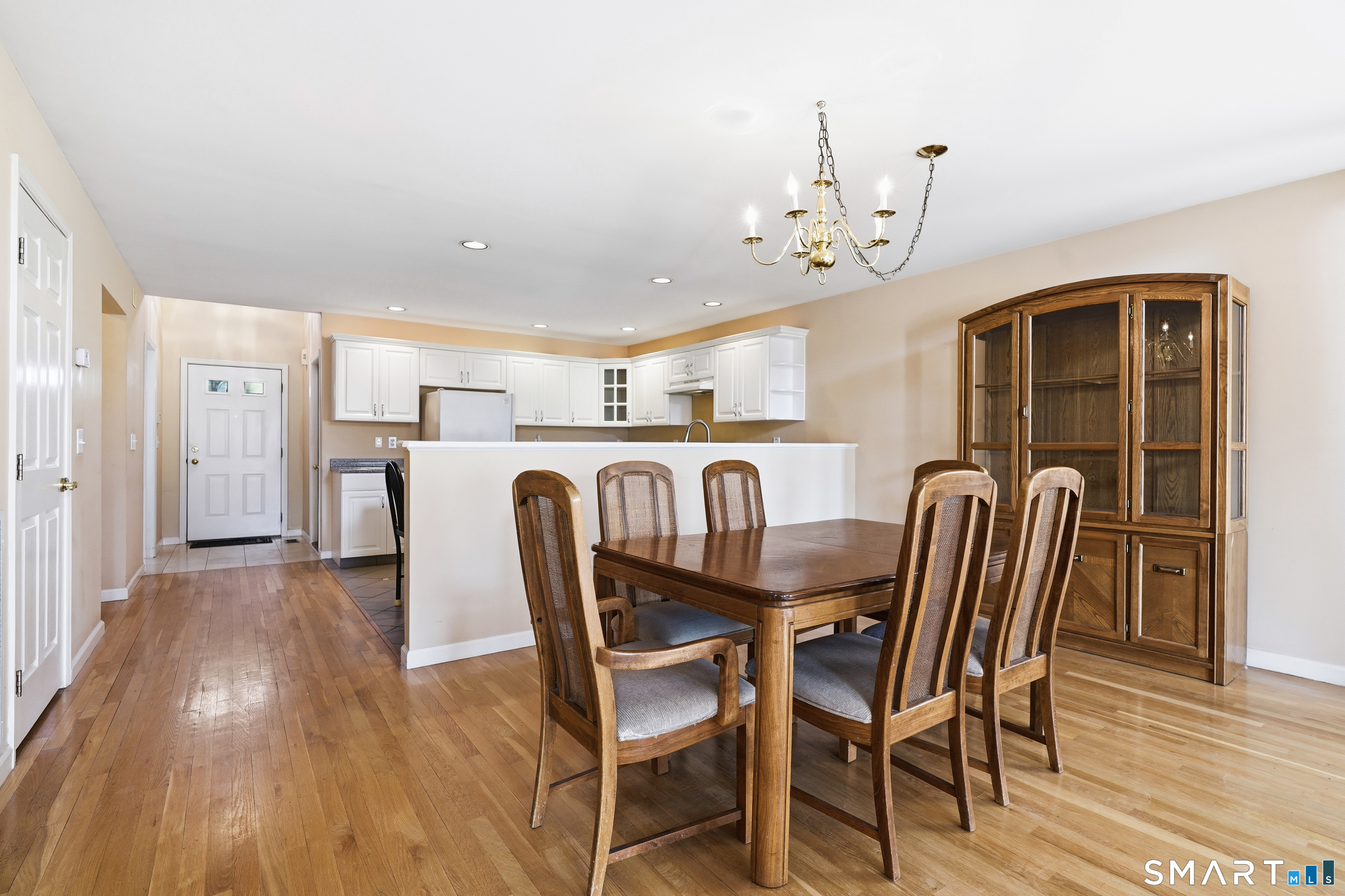 31 St George Place, Unit 31 Newtown, CT 06482 - Photo 10 of 30 a view of a dining room with furniture and wooden floor