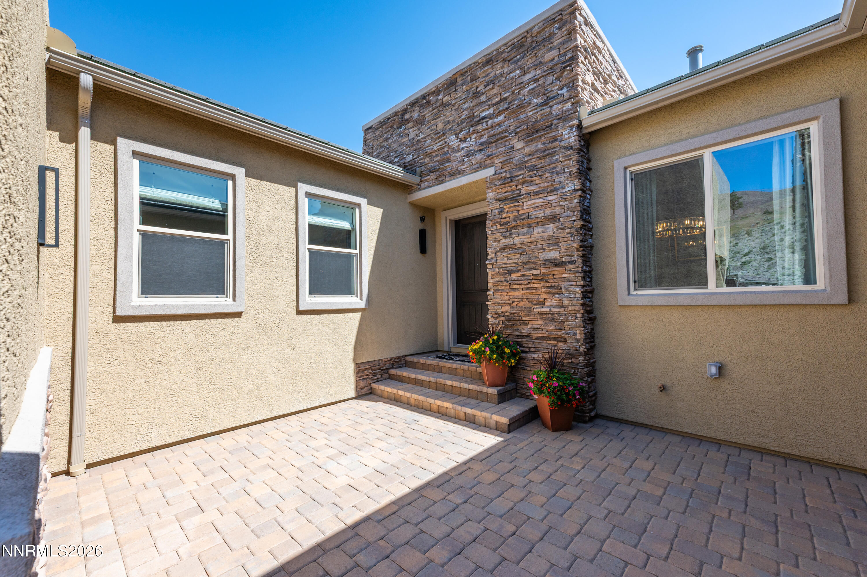 9028 Iron Sky Court Reno, NV 89523 - Photo 2 of 36 a front view of a house with an empty space