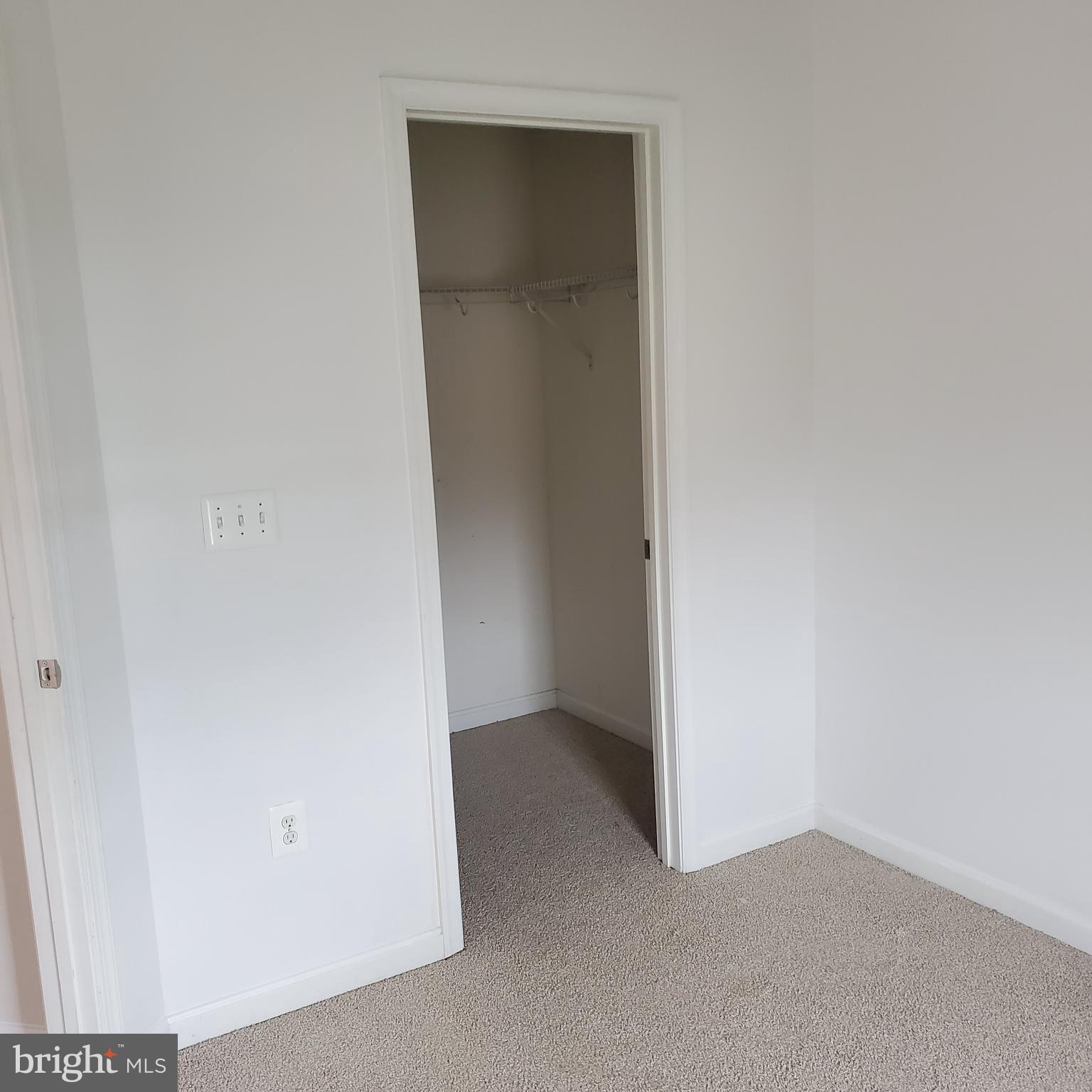 7125 Durrette Road Ruther Glen, VA 22546 - Photo 13 of 18 Upper Level Bedroom # 2 - White Walk In Closet
