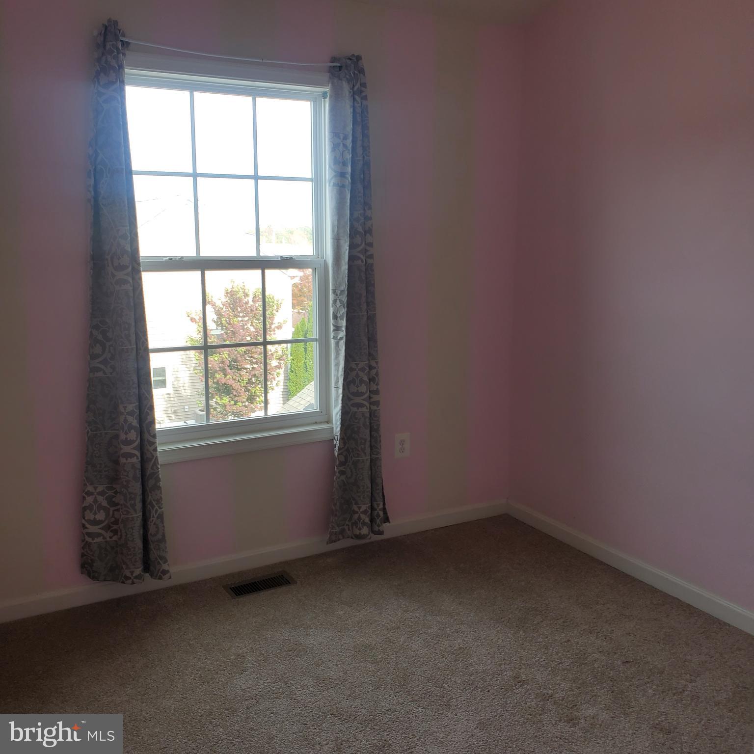 7125 Durrette Road Ruther Glen, VA 22546 - Photo 10 of 18 Bedroom 3 Upper Level - Pink