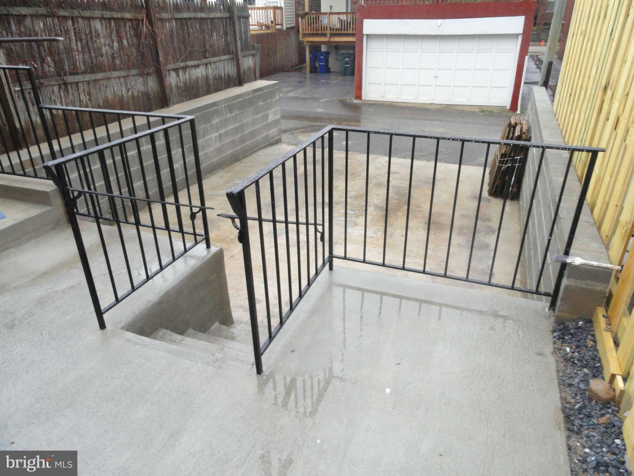 27 R Street Northeast Washington, DC 20002 - Photo 28 of 30 Rear Concrete Patio and Parking Space