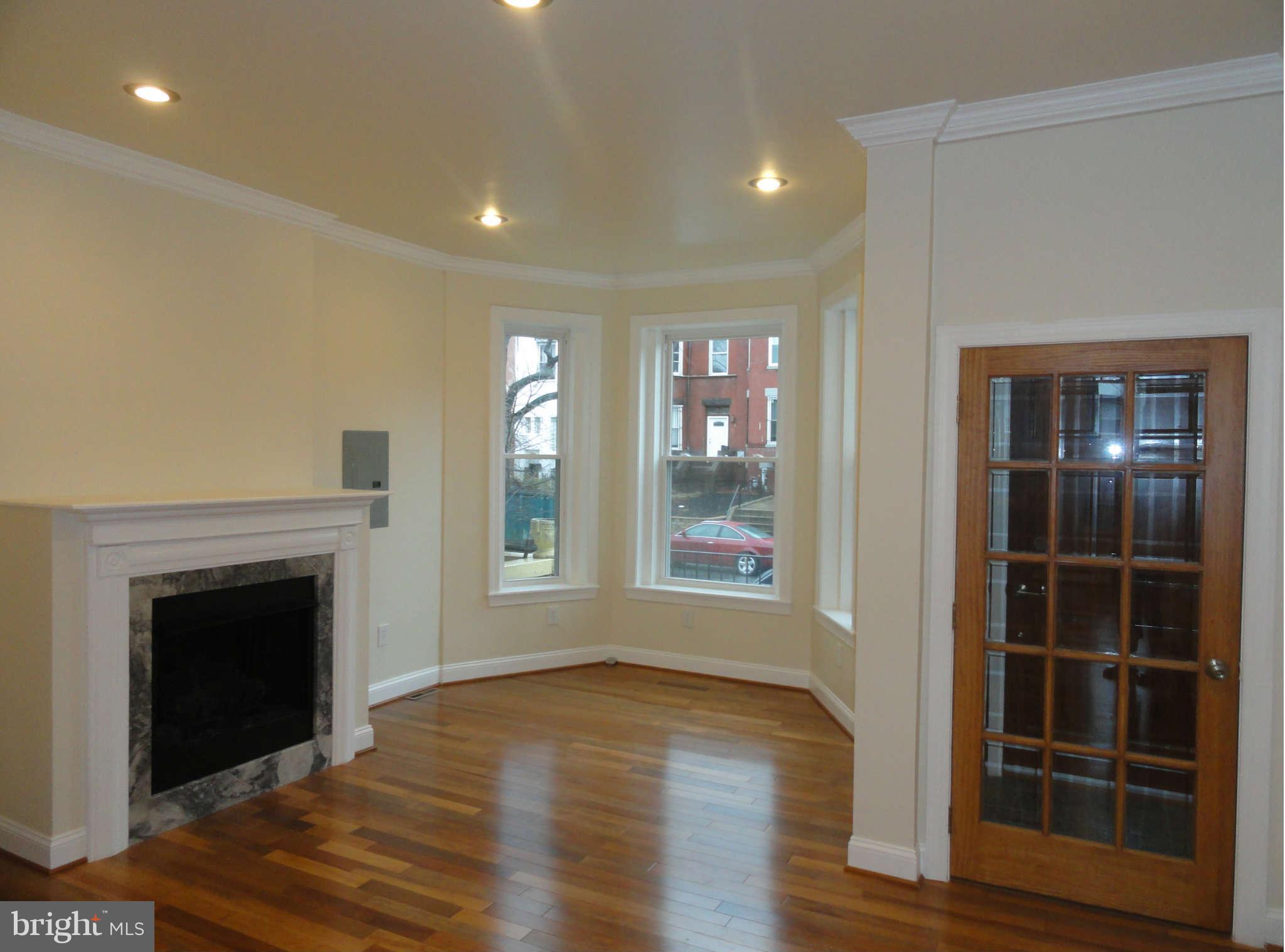 27 R Street Northeast Washington, DC 20002 - Photo 5 of 30 Living Room with Gas Fireplace