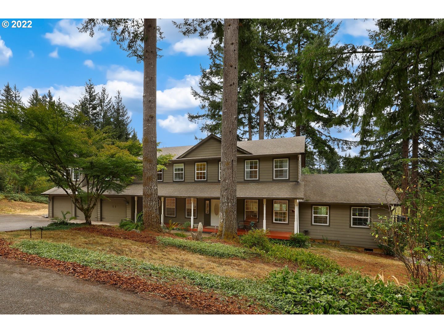 27507 Northeast 42nd Circle Camas, WA 98607 - Photo 1 of 30 a view of a yard in front of a house with large tree