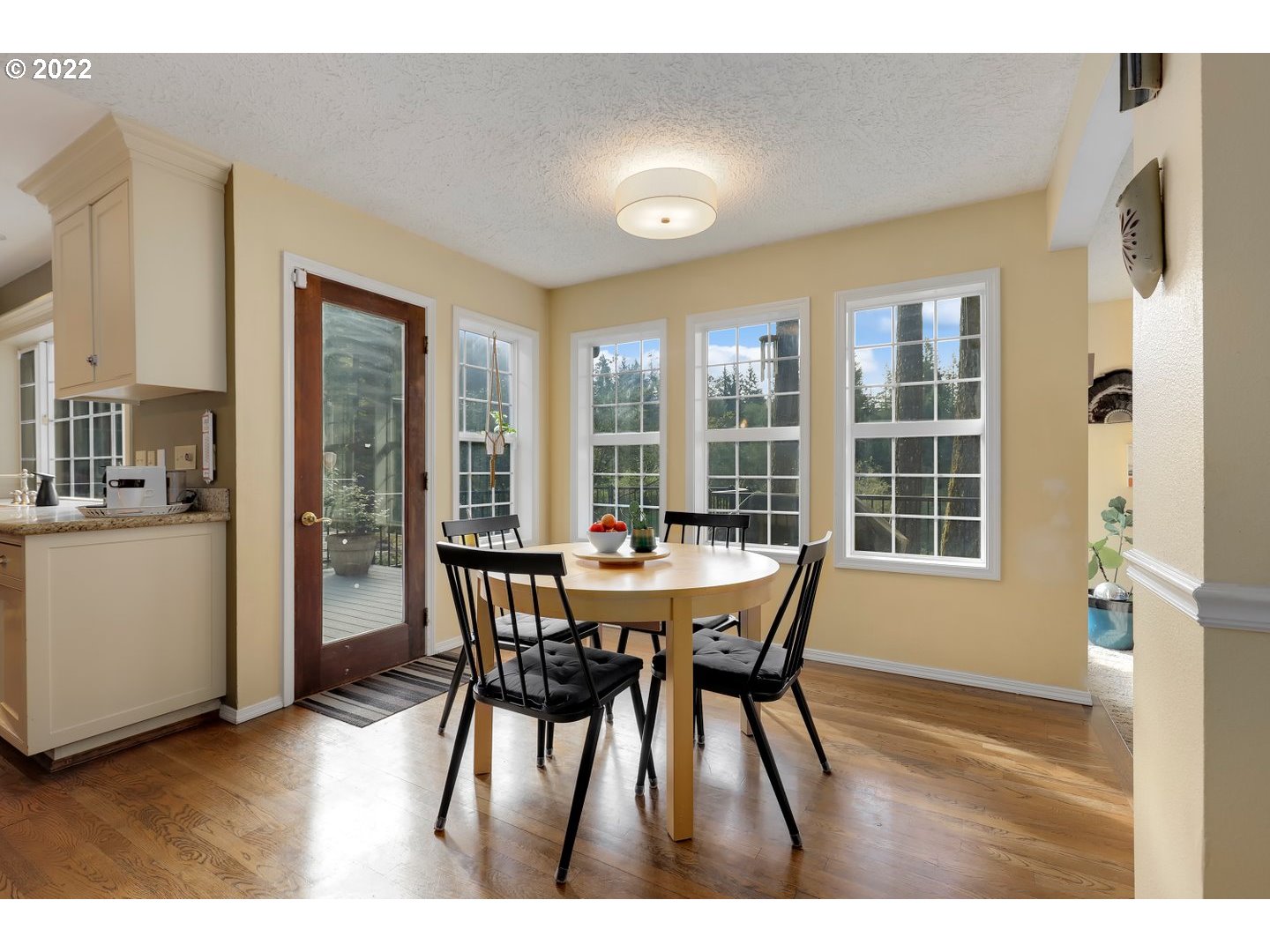 27507 Northeast 42nd Circle Camas, WA 98607 - Photo 11 of 30 a view of a dining room with furniture and wooden floor
