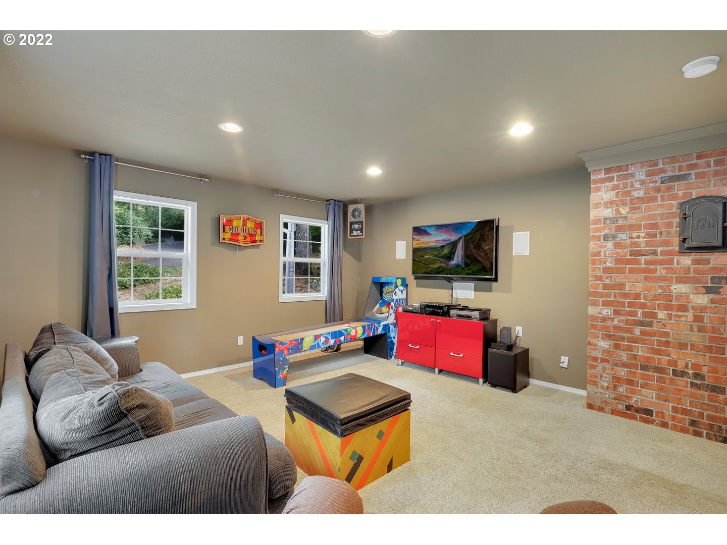 27507 Northeast 42nd Circle Camas, WA 98607 - Photo 16 of 30 a living room with furniture and a flat screen tv