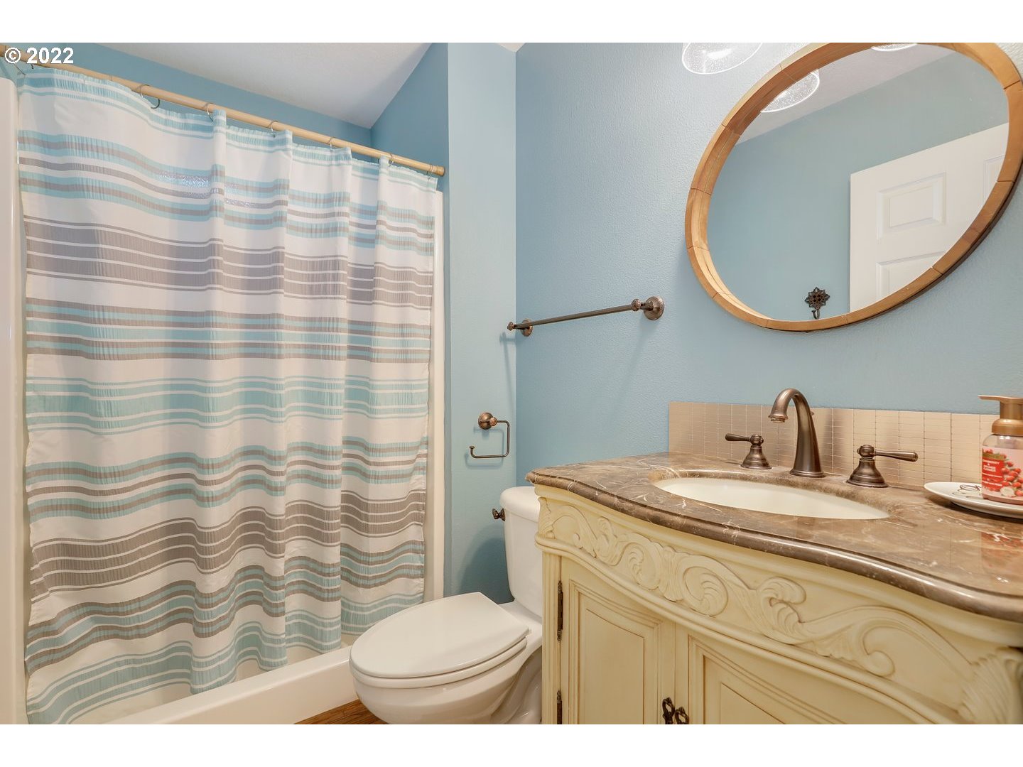 27507 Northeast 42nd Circle Camas, WA 98607 - Photo 17 of 30 a bathroom with a sink toilet and a mirror