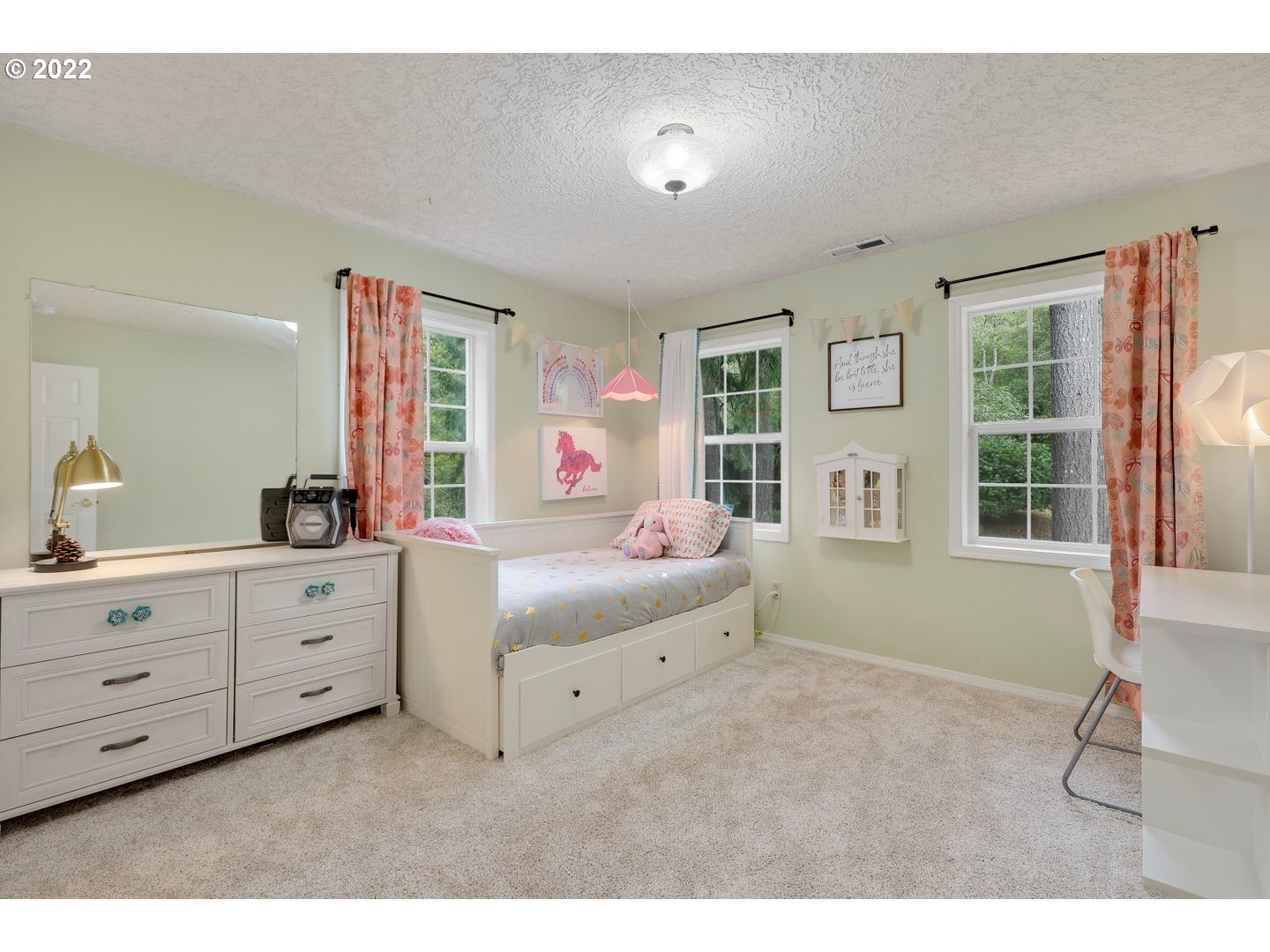 27507 Northeast 42nd Circle Camas, WA 98607 - Photo 20 of 30 a spacious bedroom with a bed and a window