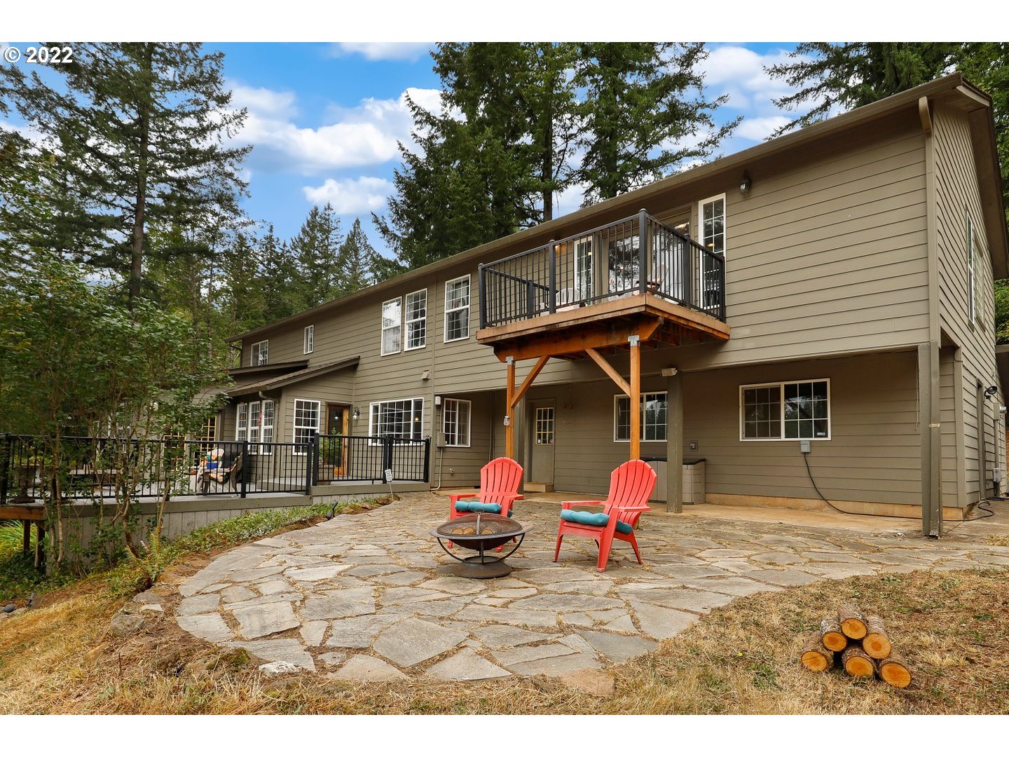 27507 Northeast 42nd Circle Camas, WA 98607 - Photo 25 of 30 a backyard of a house with table and chairs