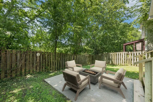 a view of a two chairs in the deck
