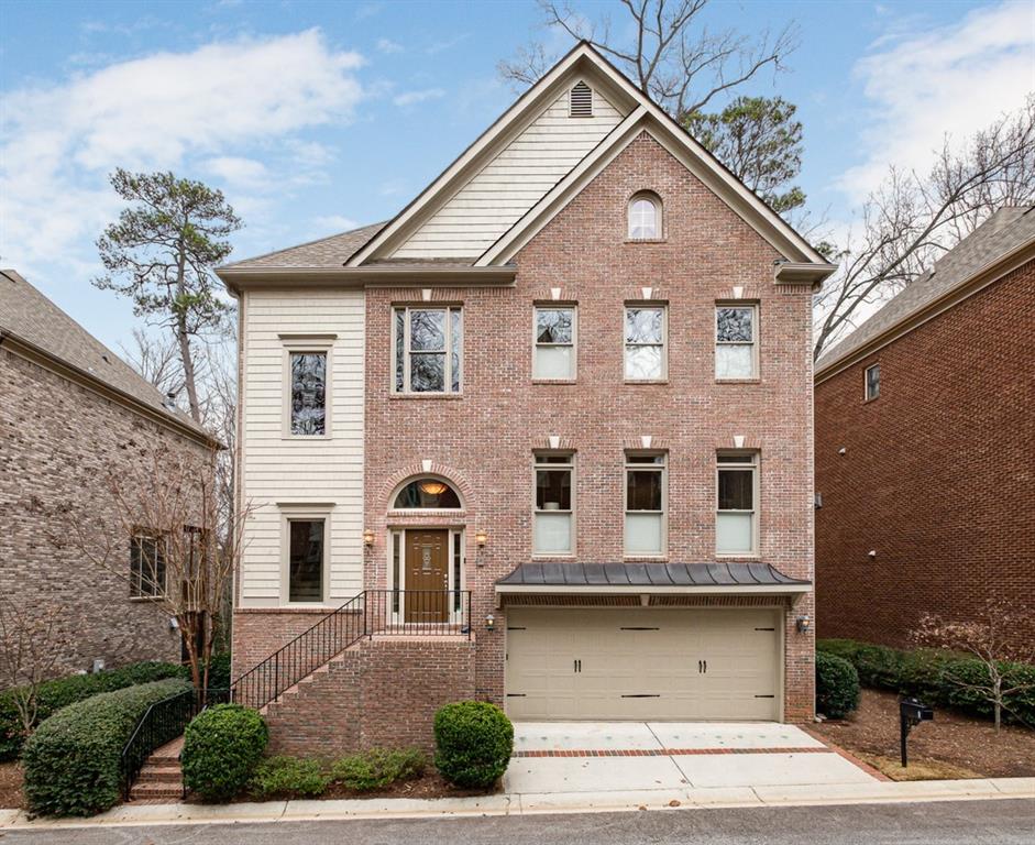 Like-new, all brick 3-level pristine home in hot Sandy Springs location!