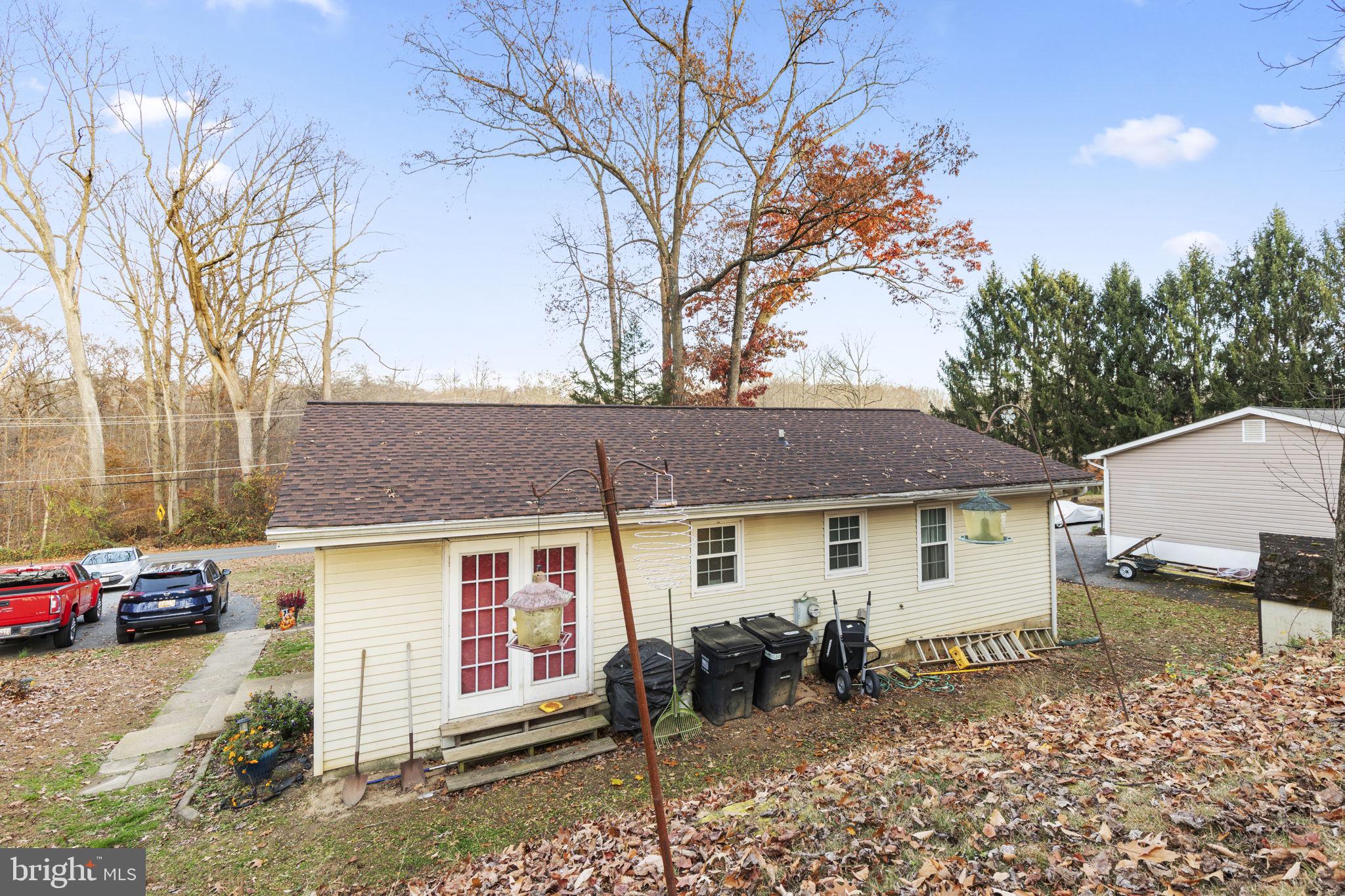 420 Jackson Park Road Port Deposit, MD 21904 - Photo 16 of 17 a front view of a house with a yard