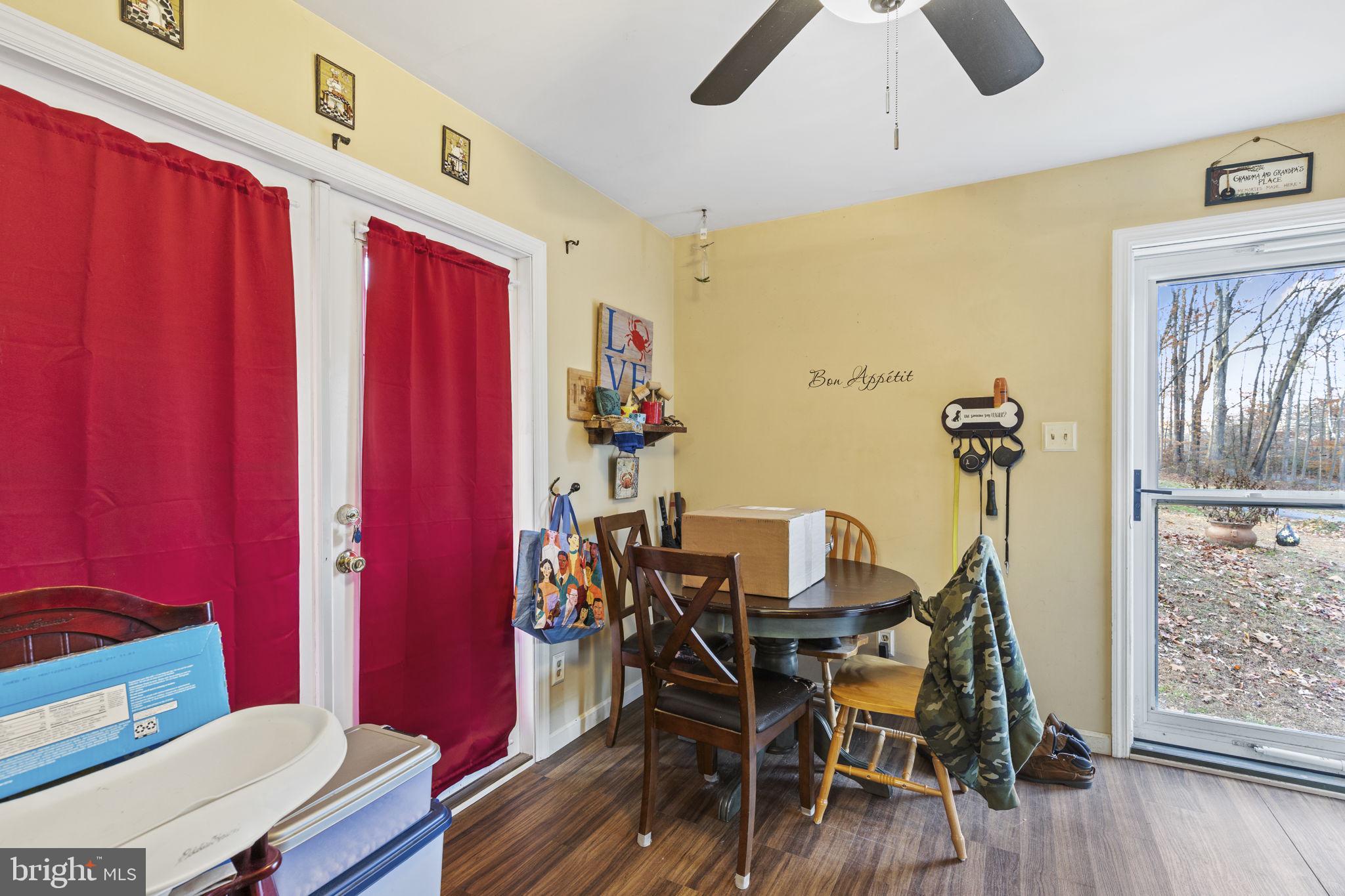 420 Jackson Park Road Port Deposit, MD 21904 - Photo 8 of 17 a view of a dining room with furniture and wooden floor