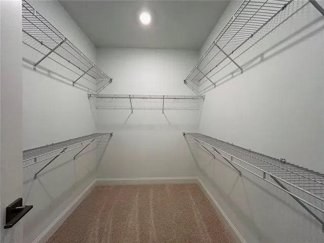 a view of a room with racks on the wall