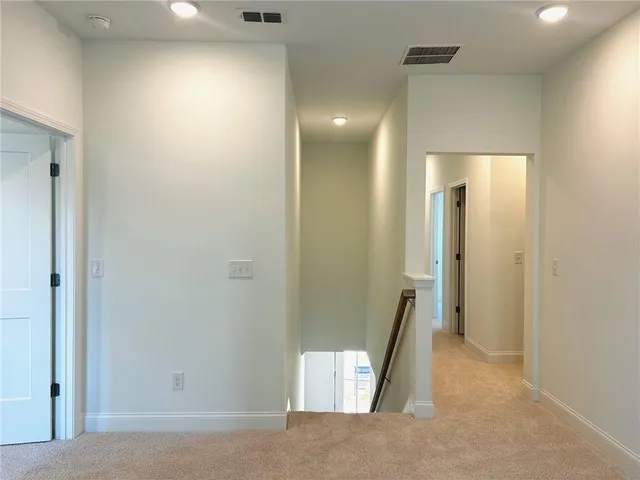 a view of a hallway with entryway